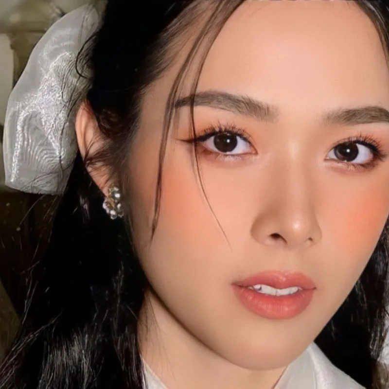Makeup cô dâu tone cam đào